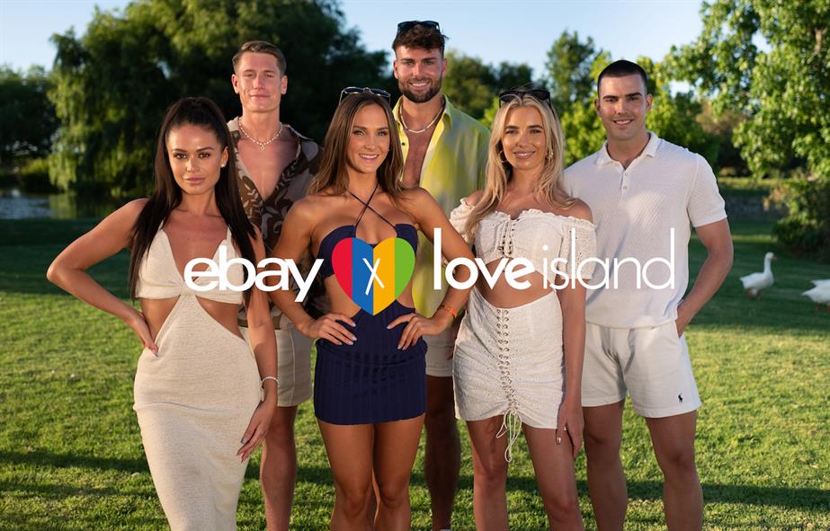 Cast of Love Island behind the logo for the show and EBay.