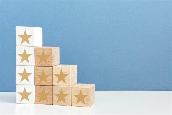 Stacked wooden blocks with stars on them