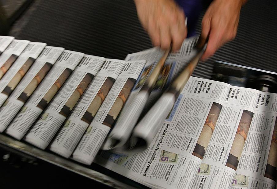 Newspapers at a printing facility