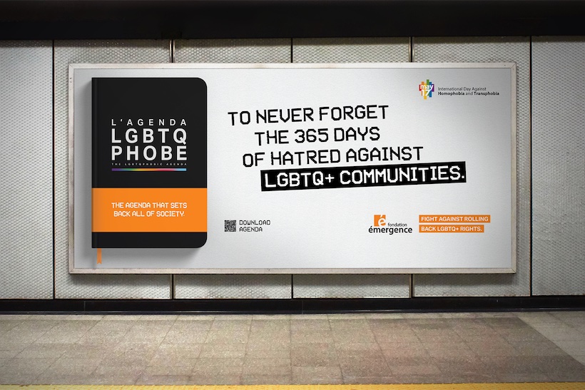 Out-of-home ad billboard reading "To never forget the 365 days of hatred against LGBTQ+ communities"