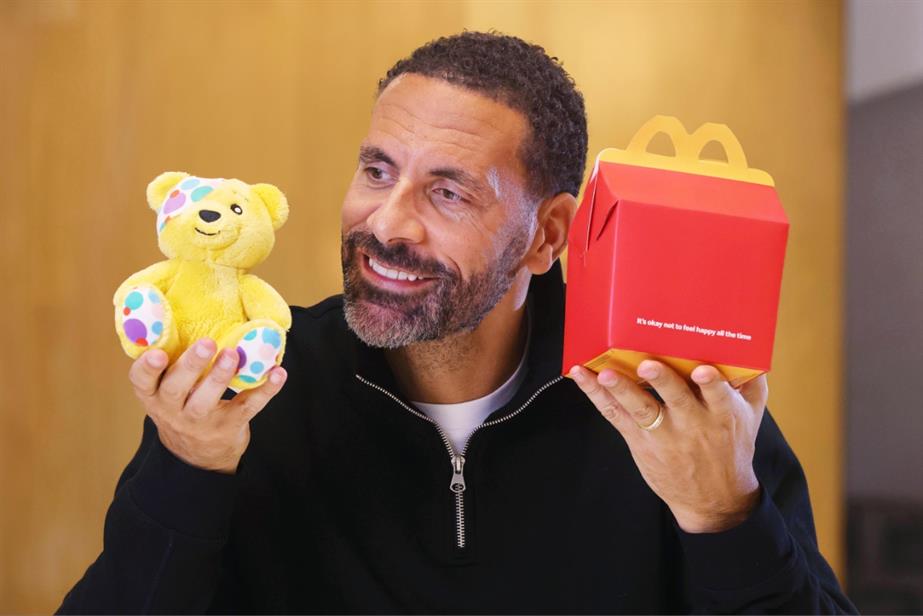 Rio Ferdinand holding Pudsey Bear and Happy Meal box 